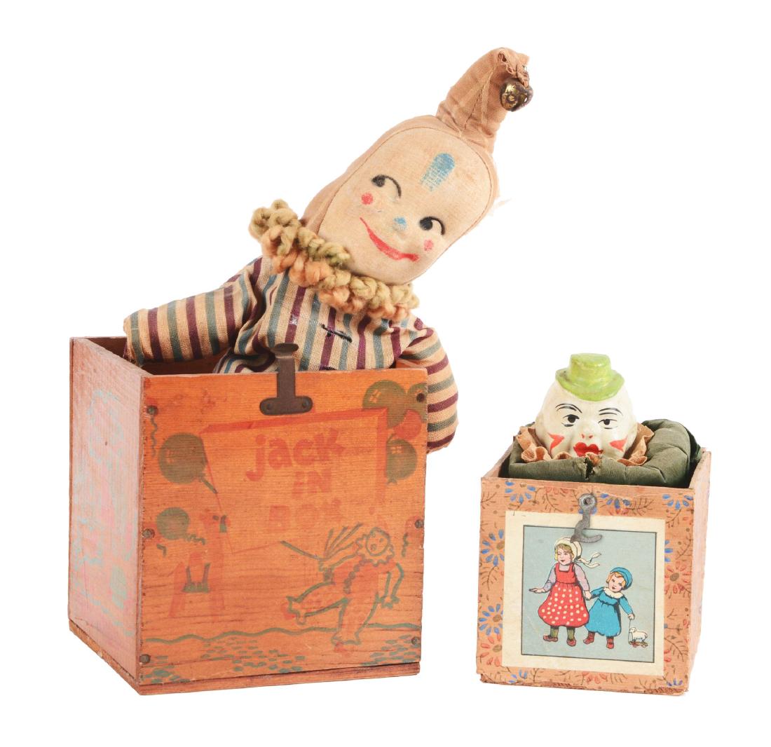 Lot of 2: Early Pre-war Jack In The Box.: The larger one is unmarked but most likely American made. The figure is all cloth with a metal bell on the end of the hat. This one is missing the top to the box. The smaller one is stamped "Germany"