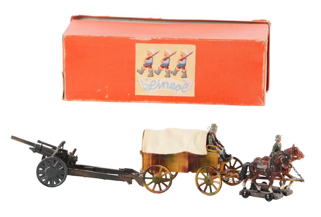German Lineol Horse Drawn Cason Wagon With Original: From the Collection of Investment Rarities Inc. Box is marked "Lineol No. 1110 Plan Wagon Mit Bespannung". Some edge wear and creasing to box. Set includes horse drawn Caisson wagon with three soldier