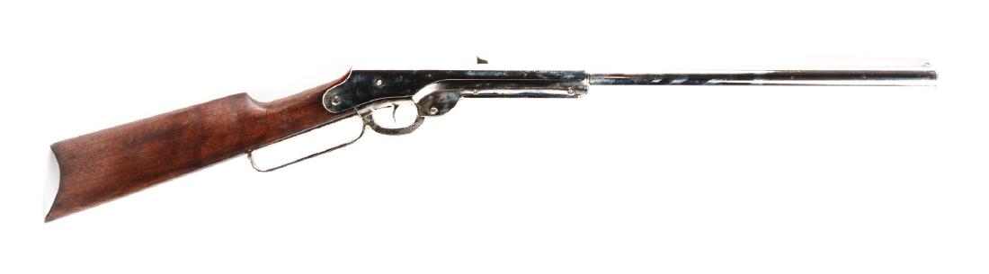 Daisy Bennett 1000 Shot Air Rifle.: Manufactured 1903-1909. BB/.175 caliber, 1000 shot. Pitting on lever. Nice wooden stock with metal butt plate. Some wear marks under barrel. Excellent re-finished condition. Front and rear sights. Fin