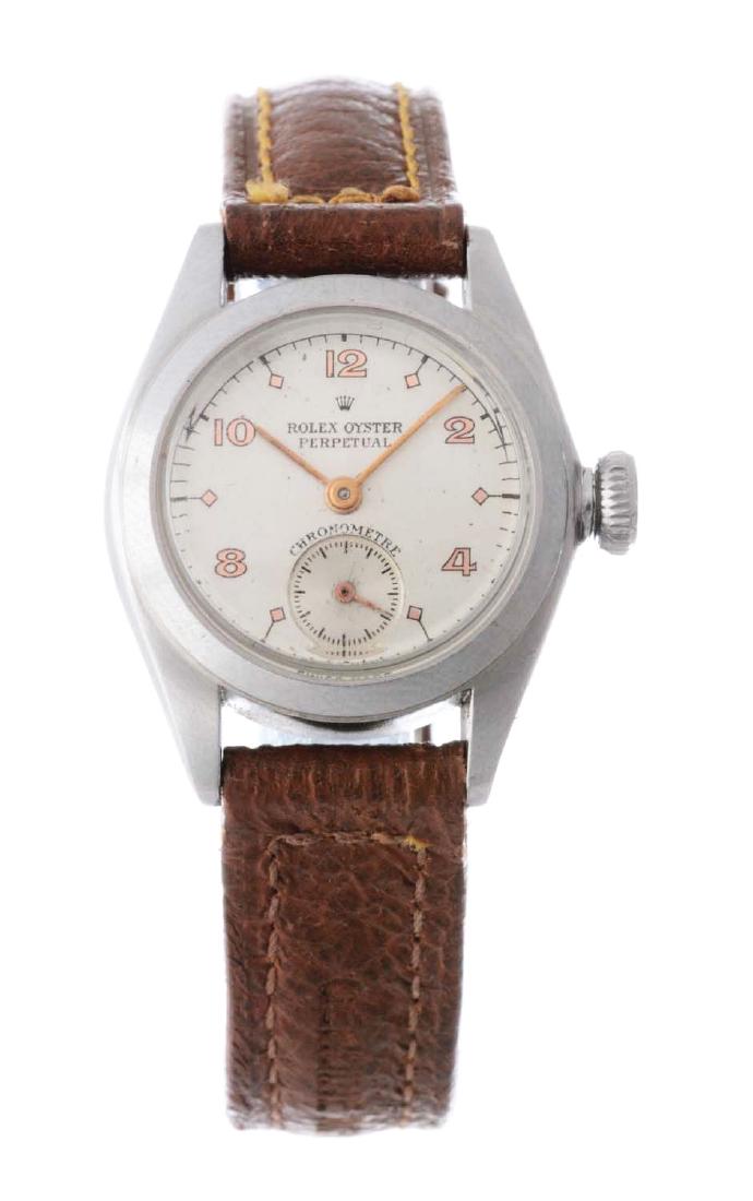 Vintage Rolex Stainless Steel Oyster Perpetual Ladies: Vintage Rolex Stainless Steel Oyster Perpetual Ladies. The model number of this Rolex is 3869. The case is stainless steel with smooth stainless steel bezel. The case measures 34mm in diameter. Featur