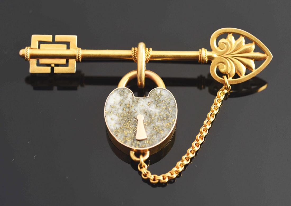 Gold Quartz Lock And Key Pin.: Nice detail, 11.3 DWT, 14 kt. gold. Condition: (Excellent). Dimensions: