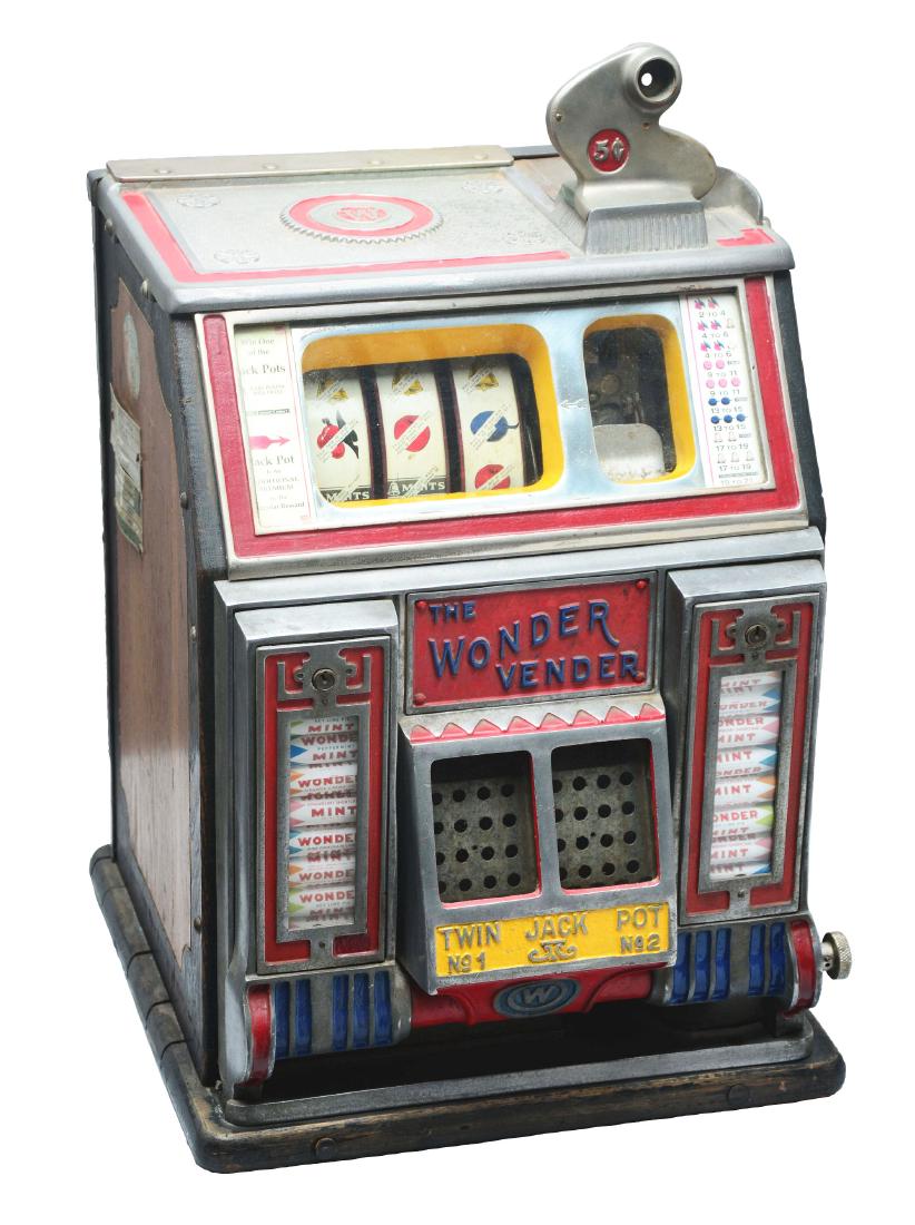 **5¢ Watling The Wonder Vender Slot Machine.: This is a slot machine with a mint vender contained with Wonder Mint confectioneries flanked on each side of the double "Twin Jackpot" reserve, called the Wonder Vender and was manufactured by Watling