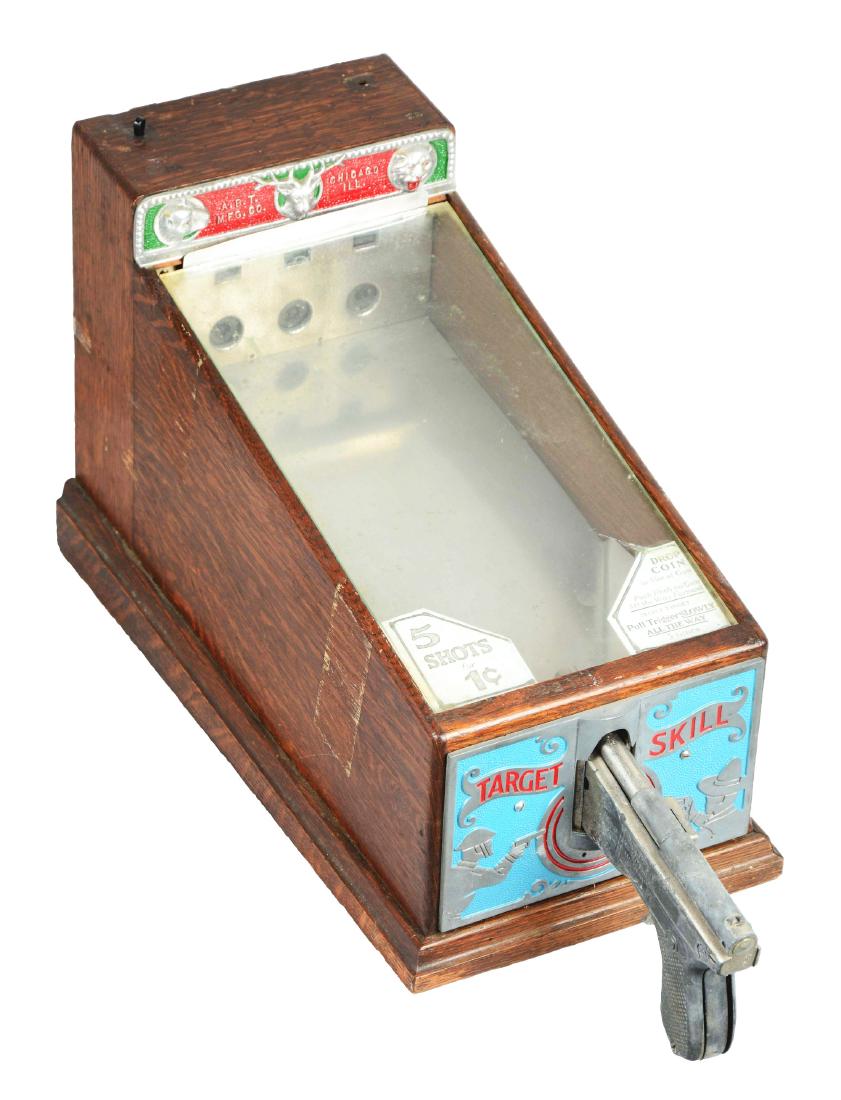 1¢ A.B.T. Target Skill Pistol Game.: An early countertop pistol game produced by A.B.T. Mfg from 1925-1939. With three targets, above which are reels that keep score. Some wear is evident on the cabinet in the form of tape residue. One k
