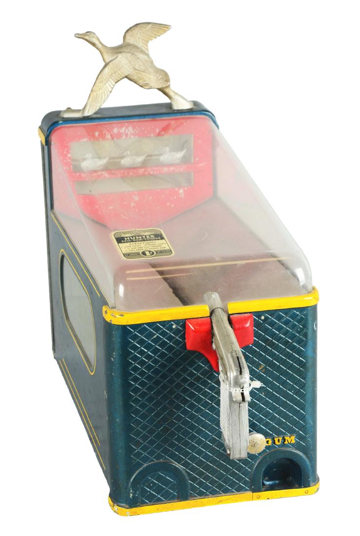 1¢ Duck Shooting-National Hunter Arcade Gumball: A very simple game but worth every penny and doubles as a gumball machine. By cocking back the hammer and placing a one cent coin at the center of the pistol, aim at one of the three silver ducks and