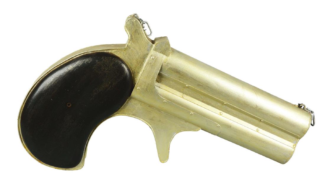 Wooden Derringer Gun Figural Trade Sign.: This is a contemporary made piece in nice condition. The paint and body of the sign are both in great condition. An excellent display piece.. Condition: (8.0). Dimensions: 34" W x 23" T x 6" D.