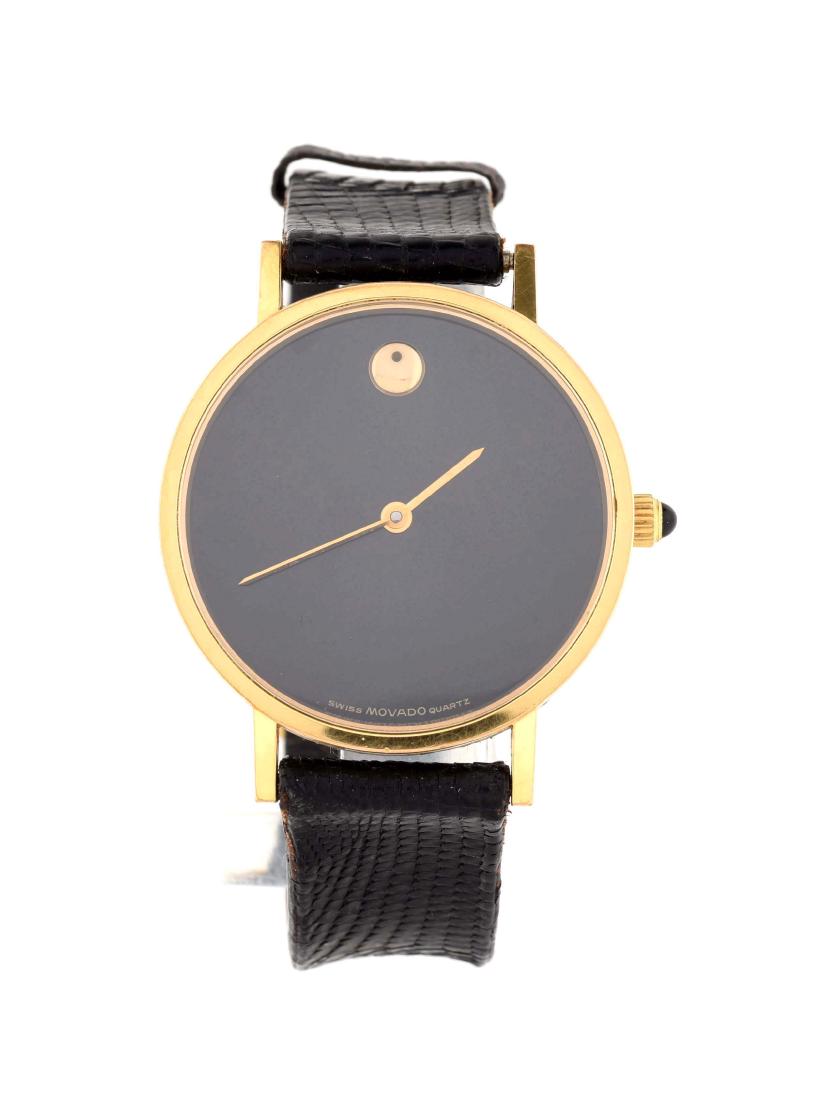 Movado Gold Plated Strap Watch.: Quartz. Gold Plated. 30mm case. Leather strap.Condition:(Excellent).Dimensions: Condition: (Excellent). Dimensions:
