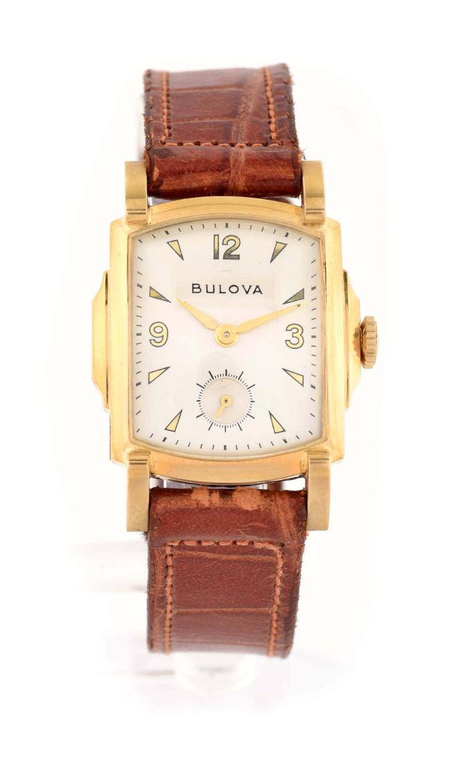 Gold Filled Bulova Strap Watch.: Original box included. Clean dial. 26mm case.Condition:(Mint).Dimensions: Condition: (Mint). Dimensions: