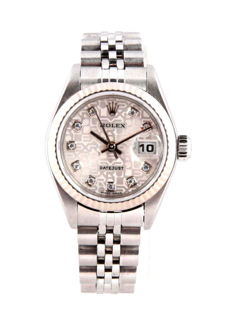 Rolex Ladies Diamond Dial Datejust Stainless Steel with: Diamond dial. Silver dial with "ROLEX". Fluted bezel. Jubliee bracelet. Original box included.Condition:(Excellent).Dimensions: Condition: (Excellent). Dimensions: