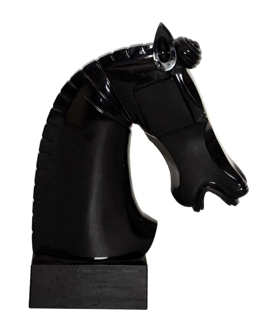 Black Murano Glass Horse Head.: This lot consists of a large beautiful black Murano horse head statue. One that is reminiscent of a chess piece, done in the art deco style with clean lines. The horse's head is situated on a black sq