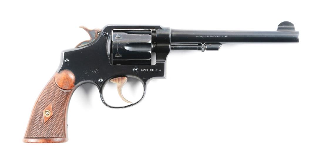 (C) Pre War Military and Police Smith and Wesson: Made between 1915 and 1942. On page 139 of the book Standard Catalog of Smith and Wesson 3rd Edition it states that this is a .38 Military and Police of 1905 4th change. Pinned barrel with round blade