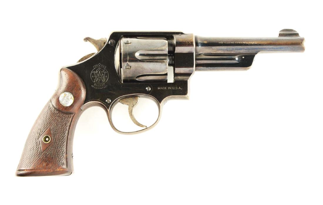 (C) Pre-War Smith and Wesson .38/44 Heavy Duty: According to a factory letter, this revolver was shipped on September 3rd, 1937 to the Oklahoma Department of Public Safety with blue finish, 5" barrel, .38 Special and checkered walnut grips. Revolve
