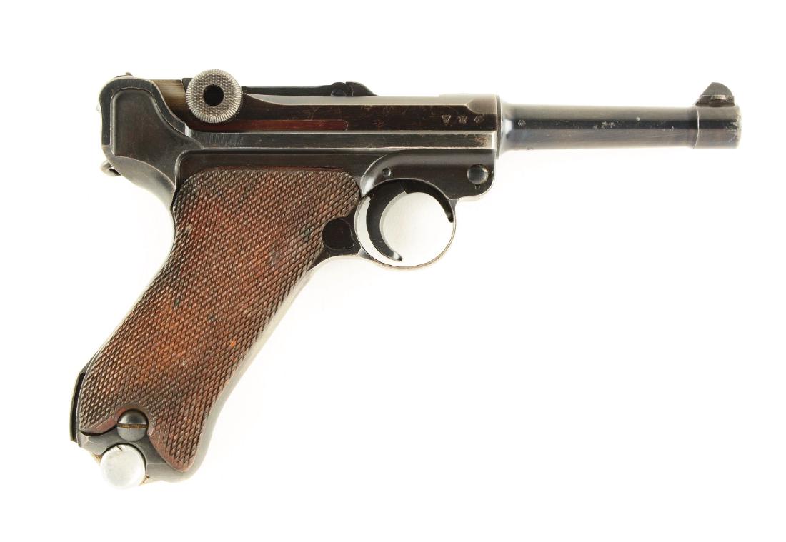 (C) Mauser S/42 1939 Dated Luger Semi-Automatic Pistol.: Features are as follows: blued barrel, frame and receiver, V notch rear sight and factory front sight and walnut checkered grips. This is your typical World War II bring back Luger. The gun retains 85