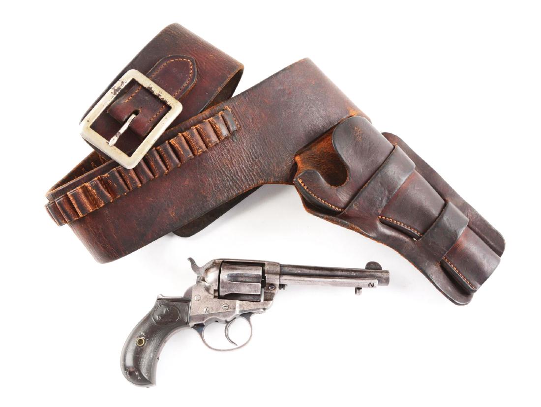 (A) Colt Model 1877 "Thunderer" Double Action Revolver.: Manufactured 1897. This was the first double action that Colt produced and made in three different calibers. B. Kittredge gave these guns the nicknames "Lightning", "Thunderer" and "Rainmaker" to boos