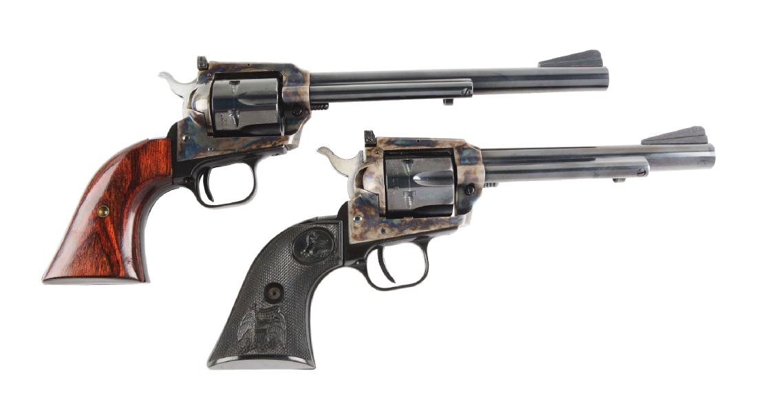 (M) Lot of 2: Boxed Colt New Frontier Single Action: Gun (A) features include round blue barrel with ejector housing, ramp front sight, adjustable rear sight, blue six shot fluted cylinder, blue grip frame, a vivid case color frame, and black plastic tw