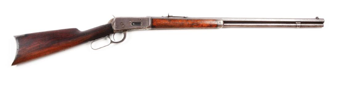 (A) 1st Year Winchester Model 1894 10 O'Clock Screw: Factory research states that rifle No. 3097 was shipped as a .38-55 with an octagon barrel on July 18th, 1895 with serial number applied February 22nd, 1895. Only the first few thousand Model 1894 rif