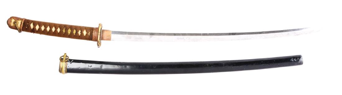 Japanese Samurai Katana Sword.: Appears to be a very late WWII issue piece. Tempered steel blade with some light spotting. Brass WWII mounts are very good. Laquered wooden scabbard has been repainted. Handle wrap is very good with s
