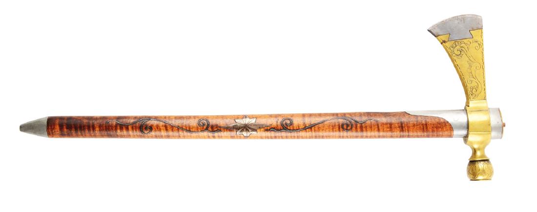 Contemporary 18th Century Style Brass Pipe Tomahawk.: Cast brass head with dovetailed steel edge, measures 6 - 1/8" overall. Both sides engraved with rococo designs and borders, rounded bowl engraved with leaf designs. Figured maple haft inlaid with silv