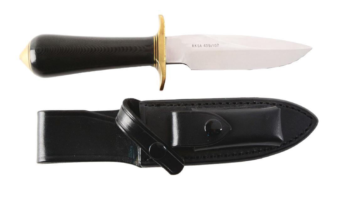 Randall Fixed Blade Knife.: Randall Made - Orlando, FLA RKSA 439/107 custom fixed blade knife with 5" saber ground spear point blade and sharpened false edge; 9 - 3/4" overall. Handled in black micarta with a heavy brass C guard