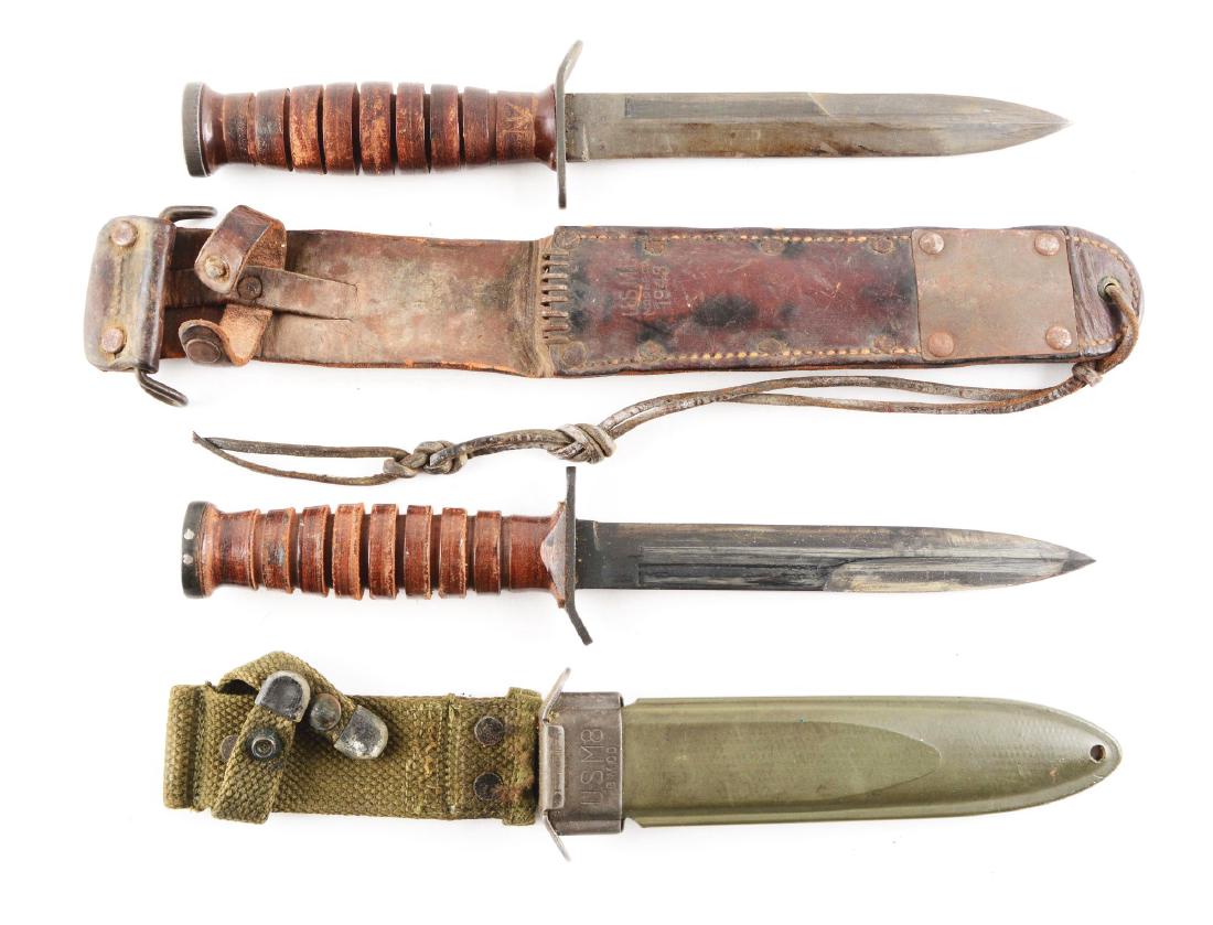 Lot of 2: Trench Knives.: (A) Imperial U.S. M3 trench knife (signed on guard) with 6 - 3/4" blade; 11 - 3/4" overall. Handled in leather with iron guard and butt. Comes with leather sheath marked "U.S. M6 MOOSE CO. 1943". Circ