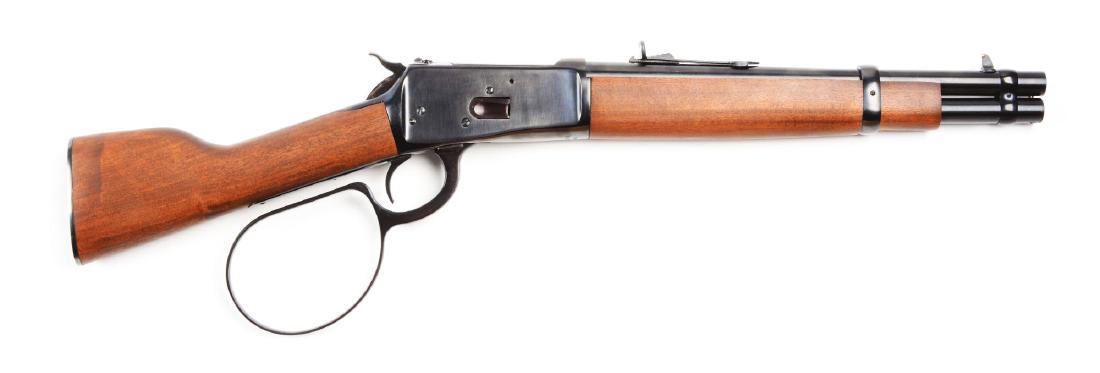 (M) Rossi R92 Ranch Hand .44 Magnum Lever Action: This is a pistol version of the Rossi carbine with a 12" round barrel, buckhorn sights, tube magazine, hardwood stocks, blued metal buttplate, large loop cocking lever and saddle ring. Over length is 