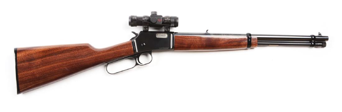 (M) Browning BL-22 Lever Action Rifle.: Blued round barrel, tube magazine, and lever-action receiver. Varnished walnut stocks. Excellent condition, appears to have seen little or no use.Barrel Length: 16"Caliber/Bore: .22 Long RifleFFL Stat