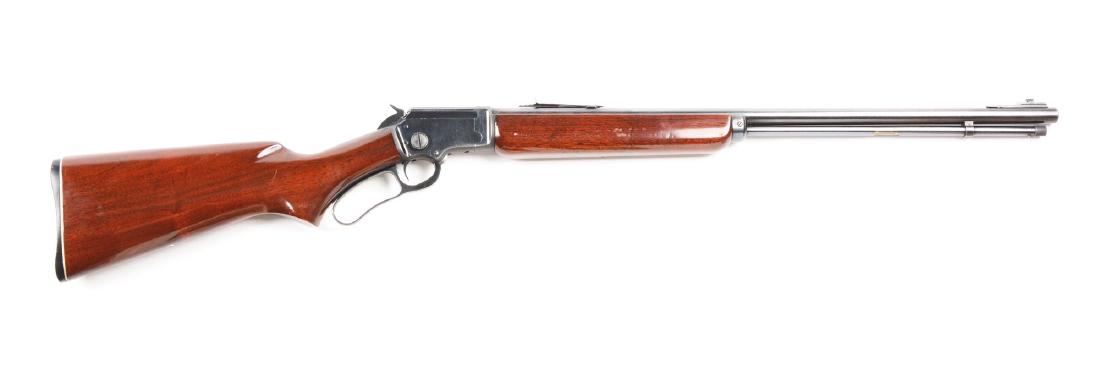 (C) Marlin Model 39A Lever Action Rifle.: Features include; Full round barrel with ramp front and adjustable rear sights. Take down lever action with exposed hammer. Full length tubular magazine. Plain walnut fore-stock. Plain walnut rear pis