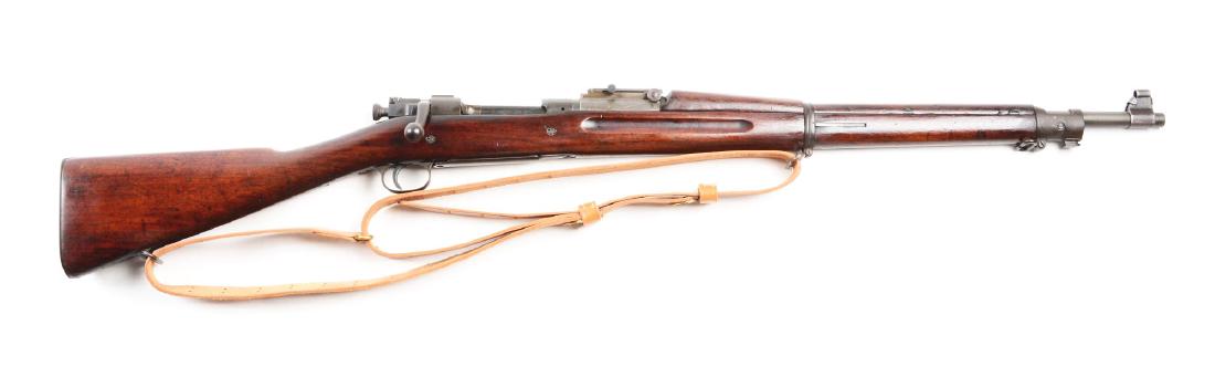 (C) Rock Island Arsenal Model 1903 Bolt Action Rifle.: Typical Augusta Arsenal stamped World War II rebuild. The barrel on this rifle is a Hi-Standard June 1944 replacement. The frame is an early post-World War I manufacture. Walnut stock is a wide finger