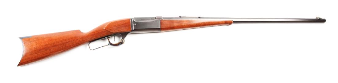 (C) Savage Model 1899 Lever Action Octagon Rifle.: Manufactured 1910. Features full octagon barrel, knife blade front sight, sporting rear sight, blued finish, brass cartridge counter, case colored lever, walnut stocks and rifle butt. This fine, early