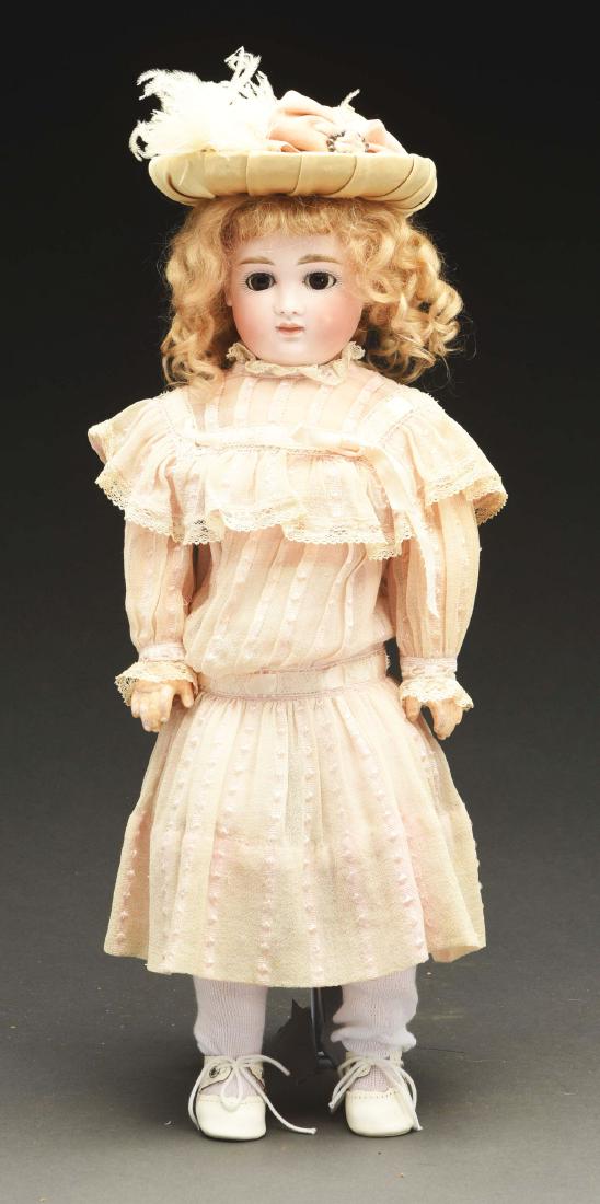 Sad Faced Closed Mouth German Doll. (1 of 3)