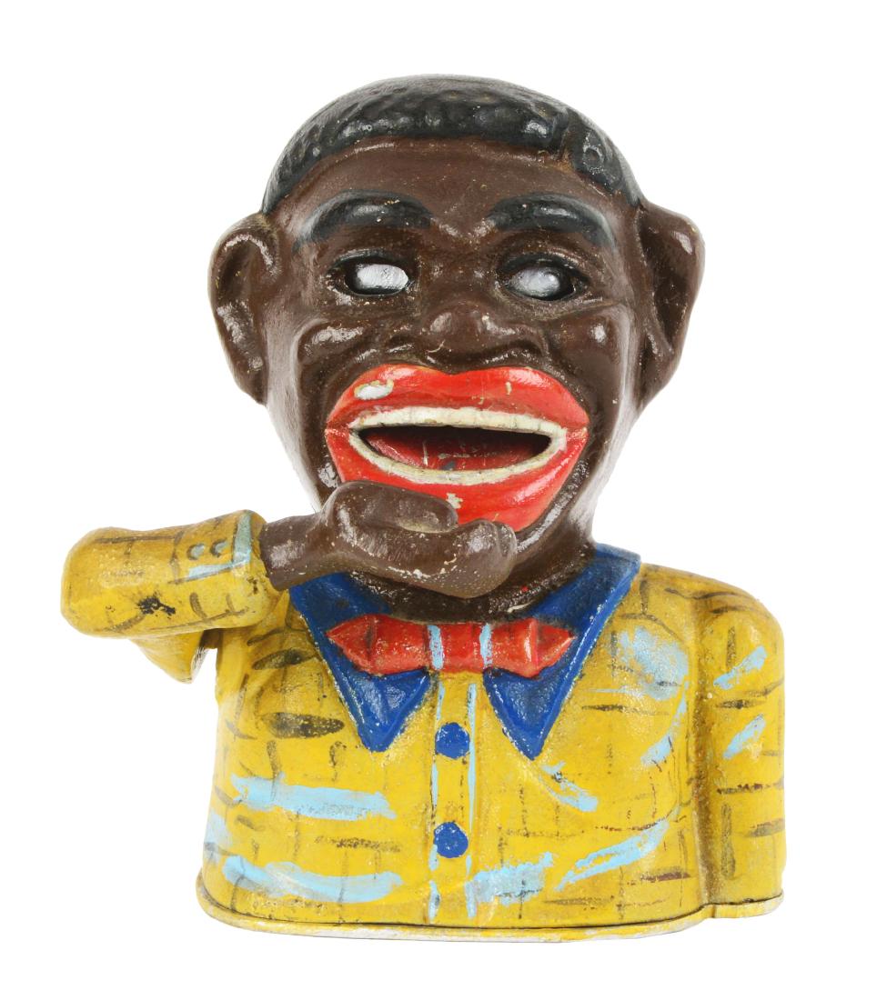 Jolly N. Bank with Yellow Shirt Mechanical Bank. (1 of 4)