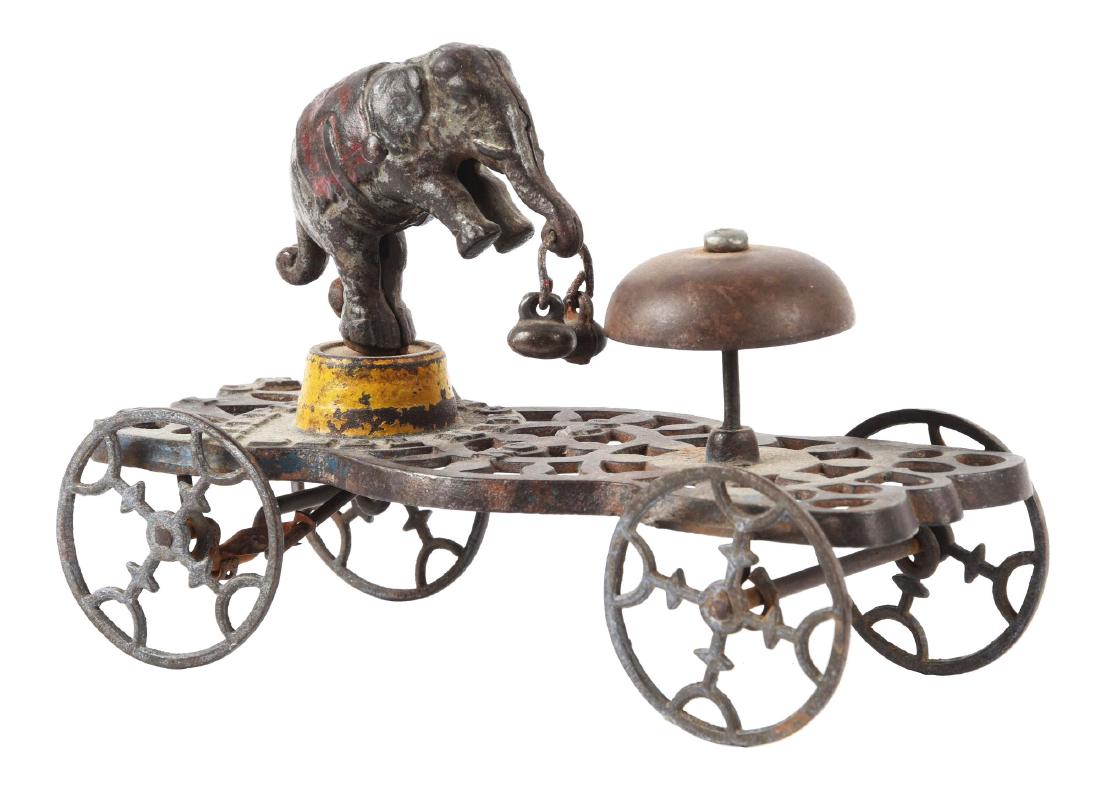 Cast Iron Gong Bell Trick Elephant Bell Ringer Toy. (1 of 2)
