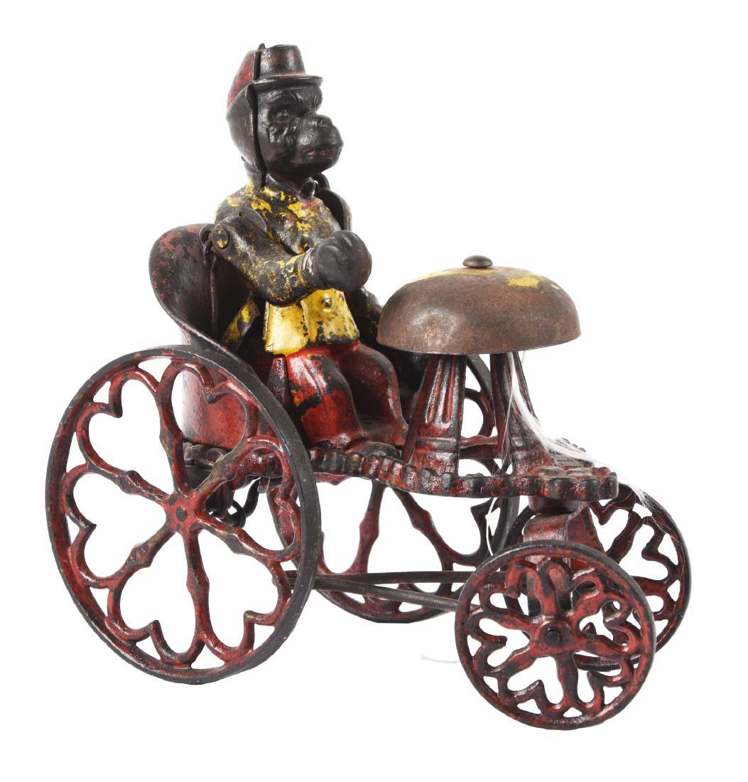 Cast Iron Kyser & Rex Monkey in Chariot Bell Toy. (1 of 2)
