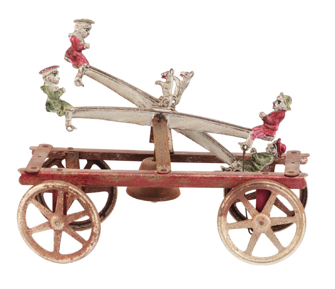 Tin Watrous Double Seesaw Toy. (1 of 3)