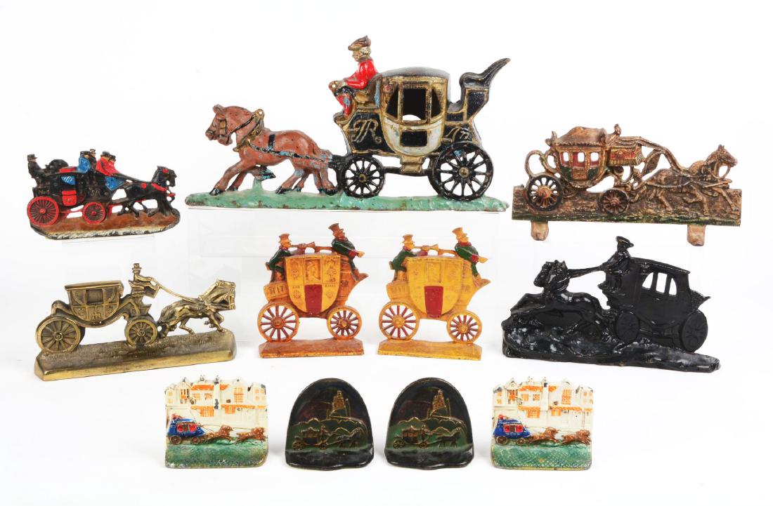 Lot of 8: Cast Iron Coach Doorstops & Bookends.: Five doorstops and three pairs of bookends. One doorstop is brass and one pair of bookends are lead. Condition: (Good - Excellent). Dimensions: Largest: 10" x 18 - 1/2".