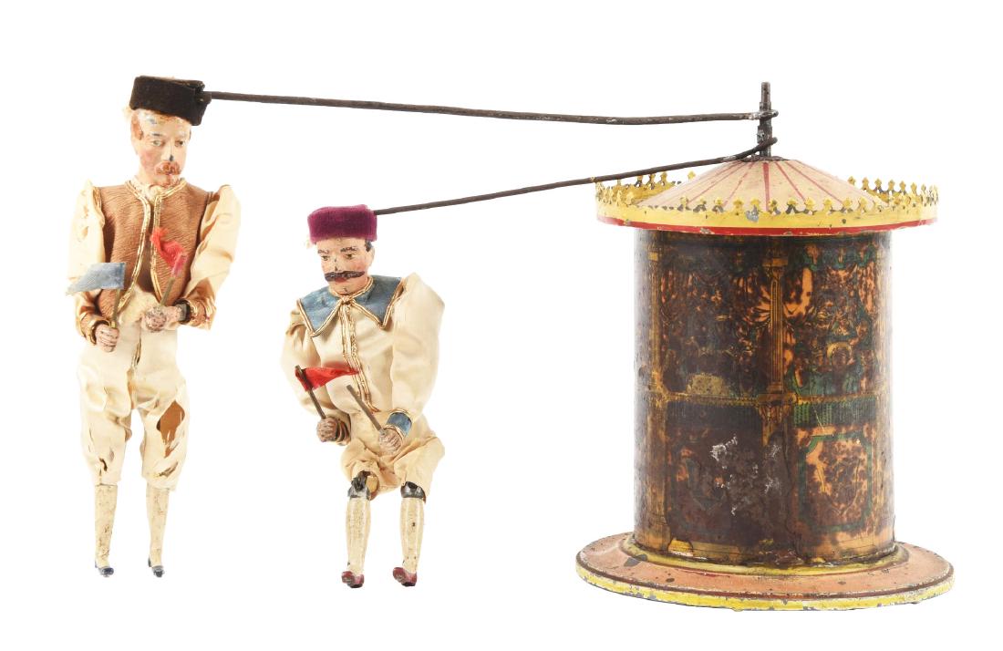Early Britain's Clockwork Race Toy. (1 of 6)