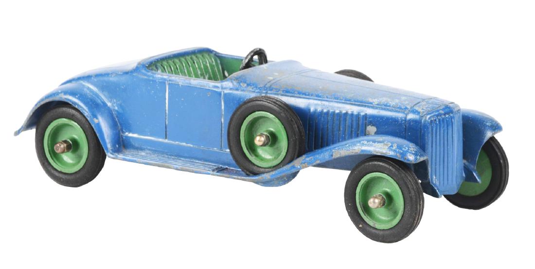 Die-Cast Faith Manufacturing Company Roadster.: Original black rubber tires, and two side mounted wheels with tires. Embossed "Chicago, Illinois" on bottom. Car has some scratching and wear throughout. Condition: (Very Good). Dimensions: 10 -1/4" x