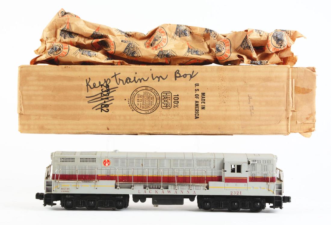 Lionel No. 2321 Lackawanna Train Master Diesel: No. 2321 locomotive has a small hairline crack at both ends where it is screwed onto the chassis, a common problem with these locomotives. Otherwise it is complete and all original. Very clean, very a