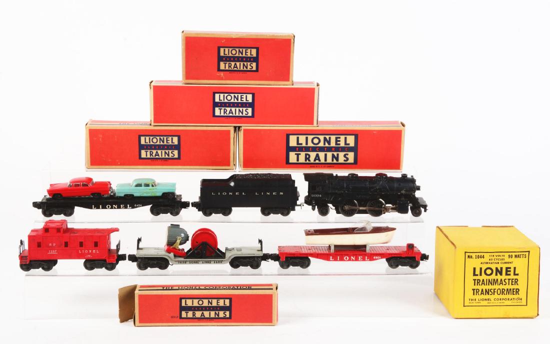 Lot of 6: Lionel Post War Trains.: Lot consists of: No. 2034 Steam Locomotive - rust on rear draw bar, complete and all original, excellent condition. No. 6066 Tender - spots of rust on frame, bar and trucks, good condition. No. 6424 F
