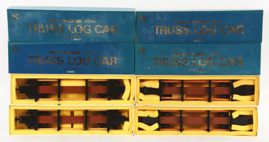 Lot Of 4: Truss Log Cars In Boxes.: 1 Gauge Truss Log cars, by Aster Hobbies, in brass. All are mint and in the original boxes. From the Ray Bentley Collection. Condition: (Mint). Dimensions: Each Box: 19 - 1/2" x 5" x 3".