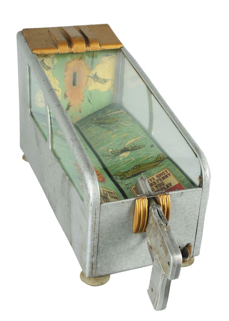 1¢ Daval Skill Thrill Countertop Arcade Machine.: This game is a one player shooting gallery game, made of sheet metal with details of silver and gold throughout but does display some wear. The interior field is brilliant with plenty of graphics that