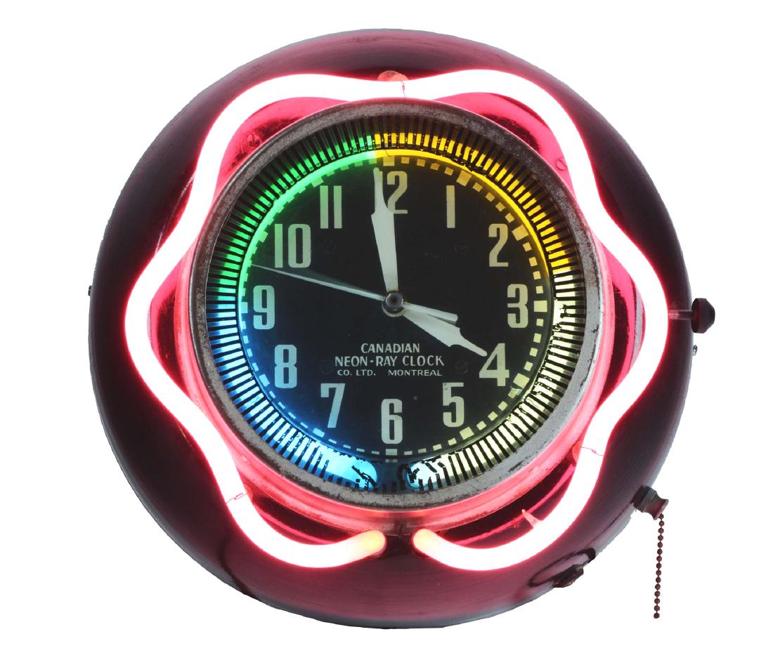 Canadian Neon Ray Glass Face Spinner Clock.