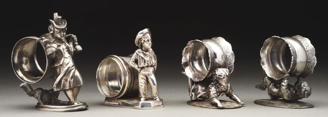 Lot of 4: Figural Napkin Rings. (1 of 2)