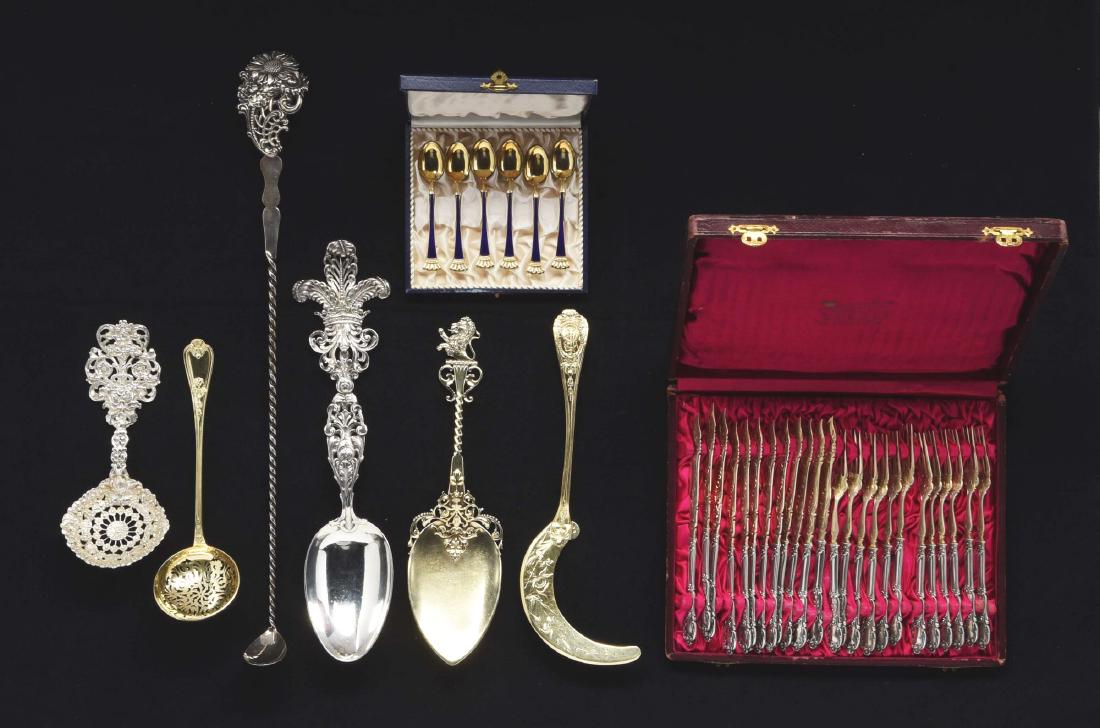 A Tiffany Sterling Cast Spoon And Others. (1 of 9)