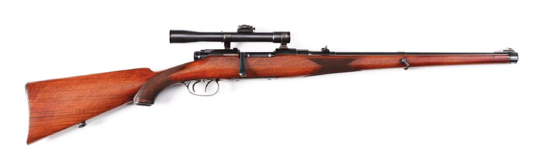 (C) Steyr Arms Mannlicher Bolt Action Rifle.: Features round barrel, ramp front sight, two leaf folding rear sight, blued finish, double set triggers, butterknife bolt, full length checkered walnut stock with straight comb, rollover cheek piece,
