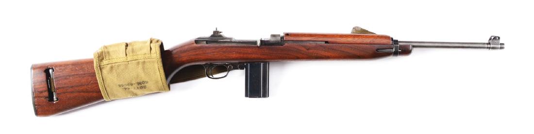 (C) Rock-Ola M1 Carbine with Sling, Extra Mag, &: Rock-Ola barrel dated 2-42 with Type 1 narrow band. Early "RR" marked flip sight with out stake marks. Proper Rock-Ola trigger assembly with dog-leg hammer. "RMC" marked two rivet handguard and IO mar