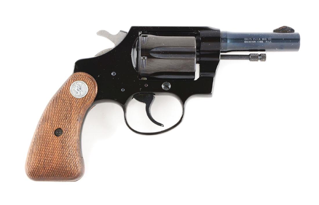 (M) Scarce 3" .22 Colt Cobra Double Action Revolver: This is a modern gun you do not see very often. Features the alloy short frame with round butt silver medallion checkered walnut grips, steel barrel and cylinder, and the seldom seen 3" .22 caliber ba