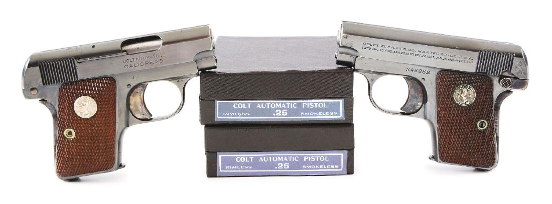 (C) Lot of 2: Boxed Colt Model 1908 Semi-Automatic: These two pistols are identical featuring blued finish, case colored trigger, grip safety and safety with silver medallion checkered walnut grips and proper two tone, tempered magazines. Both guns are