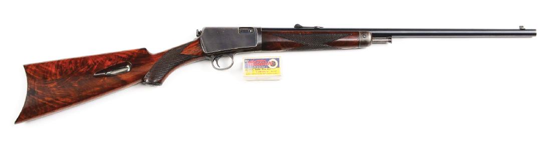 (C) Deluxe Winchester Model 1903 Semi-Automatic Rifle: Features round barrel, traditional two line factory address, sporting blade front sight, Pattern 1903 sporting rear sight, tubular magazine fed through the butt, full deluxe walnut stocks of highly fi