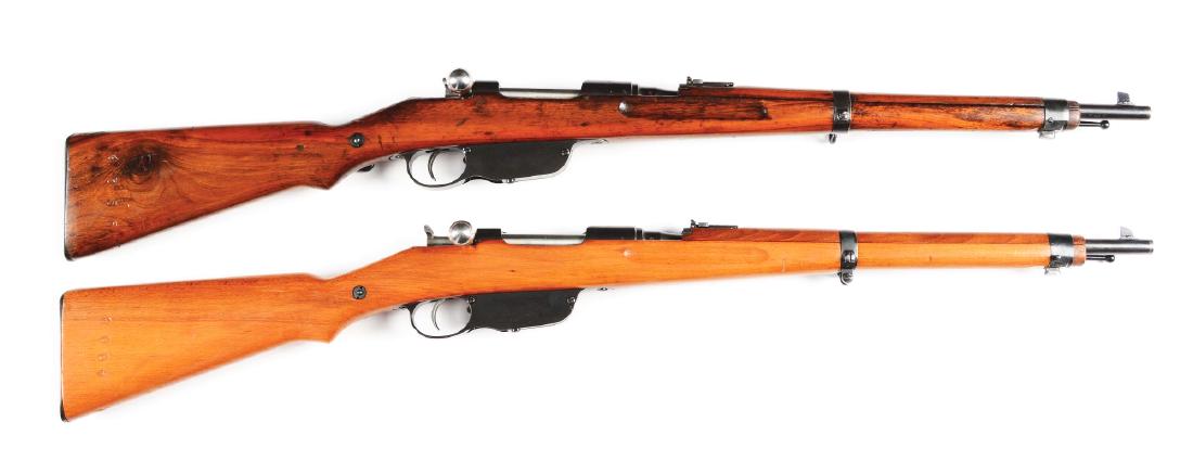 (C) Lot of 2: Austrian M95 Straight Pull Carbines.: Pair of Austrian Model 1895 Straight pull carbines. 20 inch barrel with blade front sight and ladder adjustable rear sight. Two piece military wood stocks with steel butt plate. Arsenal rebuilt and co
