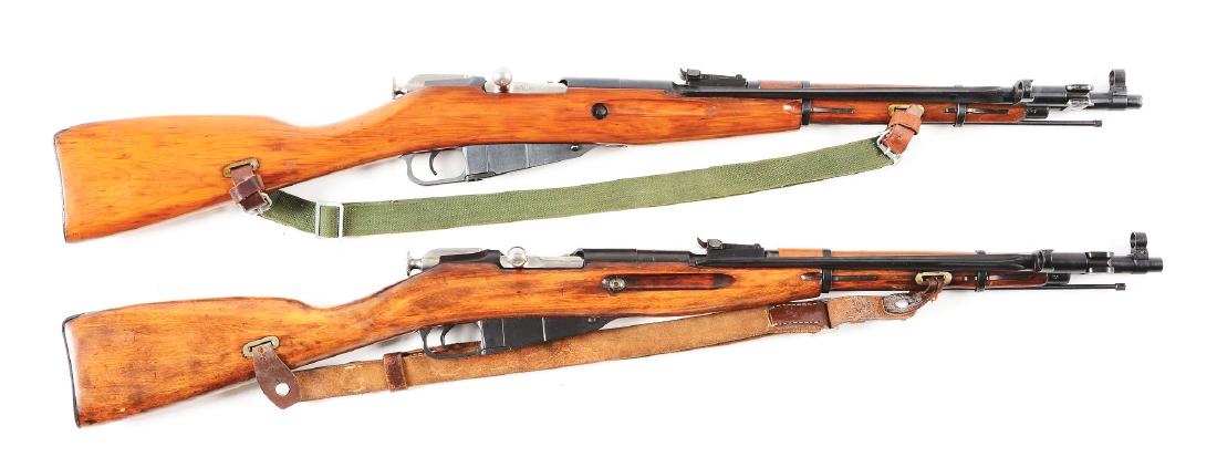 (C) Lot of 2 Post War Mosin-Nagant Carbines: Russian: Gun (A) is an Izhevsk M44 carbine dated 1946. Import marked on the barrel. Retains 90% finish. Wood is fine with some light handling marks. Fine mechanical function. Bore is fine with sharp rifling. L